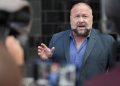 The Onion’s bid to take over Alex Jones’ Infowars is in limbo as new court battles emerge